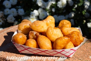 Delicious loukoumades smothered in honey and topped with cinnamon