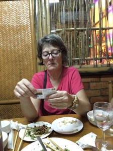 Our friend Vickie using her Travel Cards on a trip to Myanmar.